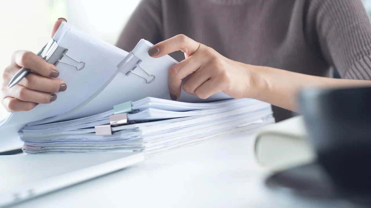 Printed records being checked for document translation services