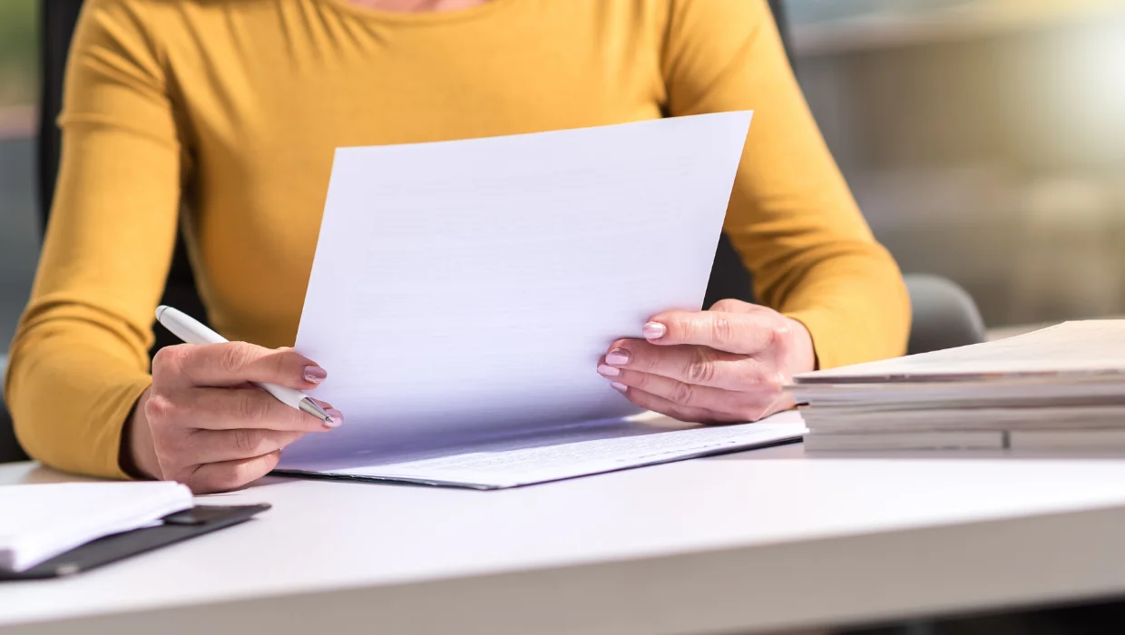 Printed pages reviewed at a desk for document translation services