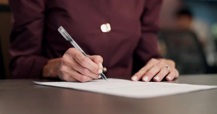 Signed paperwork prepared for document translation services